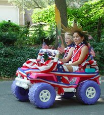 girls on a small car